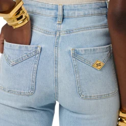 Jeans donna a zampetta con taschini