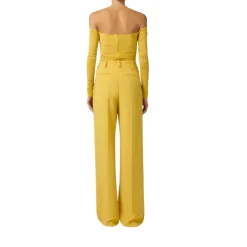 Pantaloni donna in crêpe leggero con logo charm