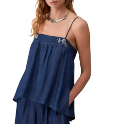 Top donna in denim con castoni