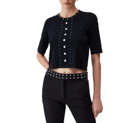 Top donna in maglia con borchie