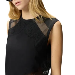 Top donna smanicato con dettagli in pizzo